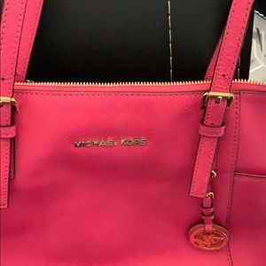 Bright pink MIchael Kors bag
